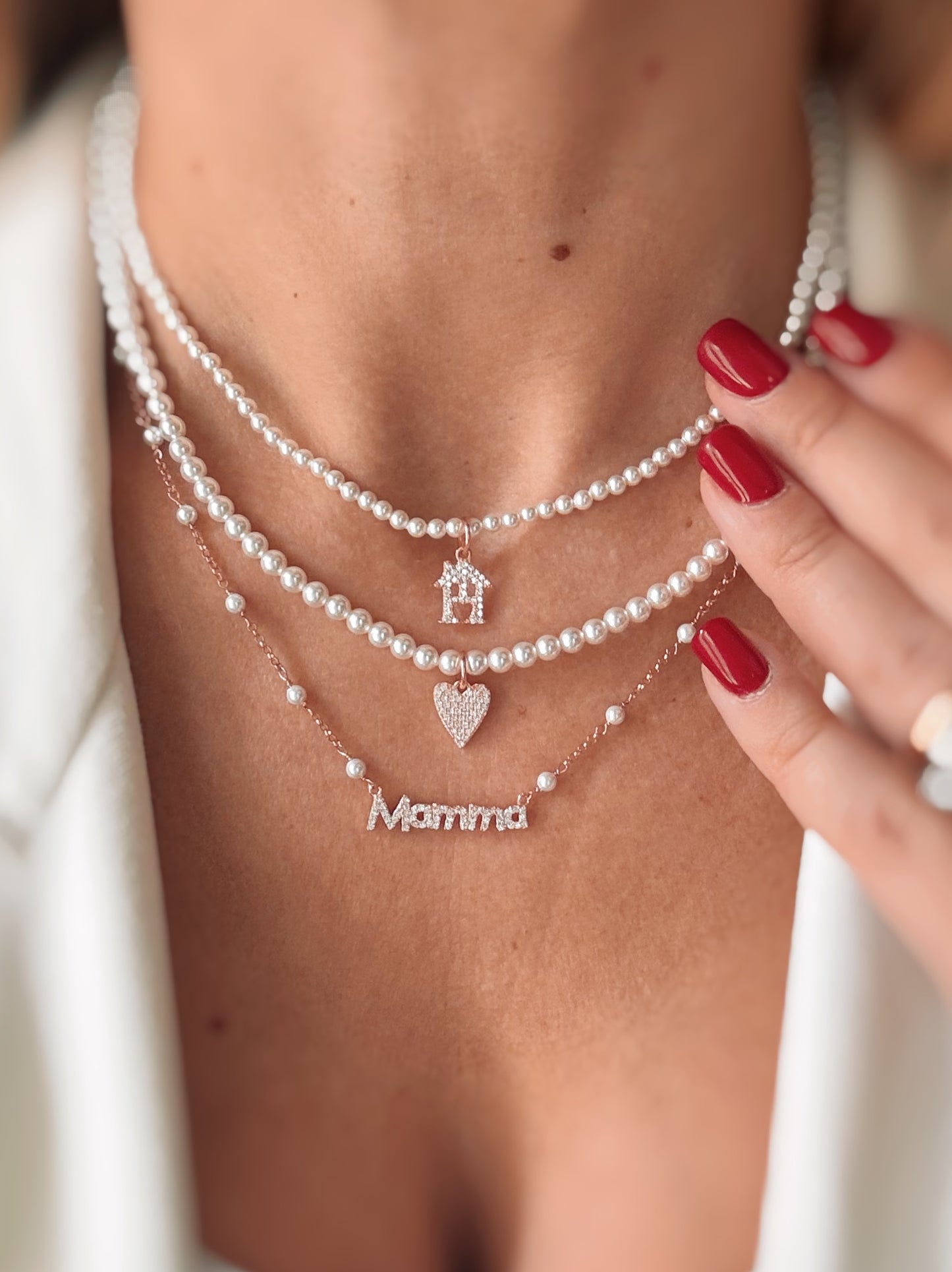 Collana perle e casetta