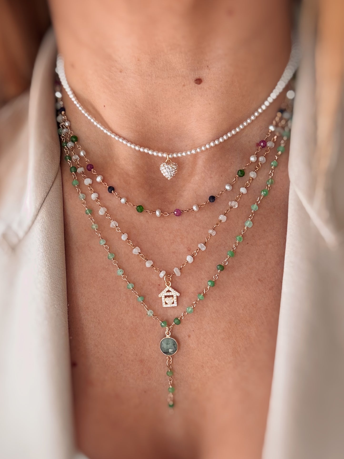 Collana cristalli bianchi e casetta