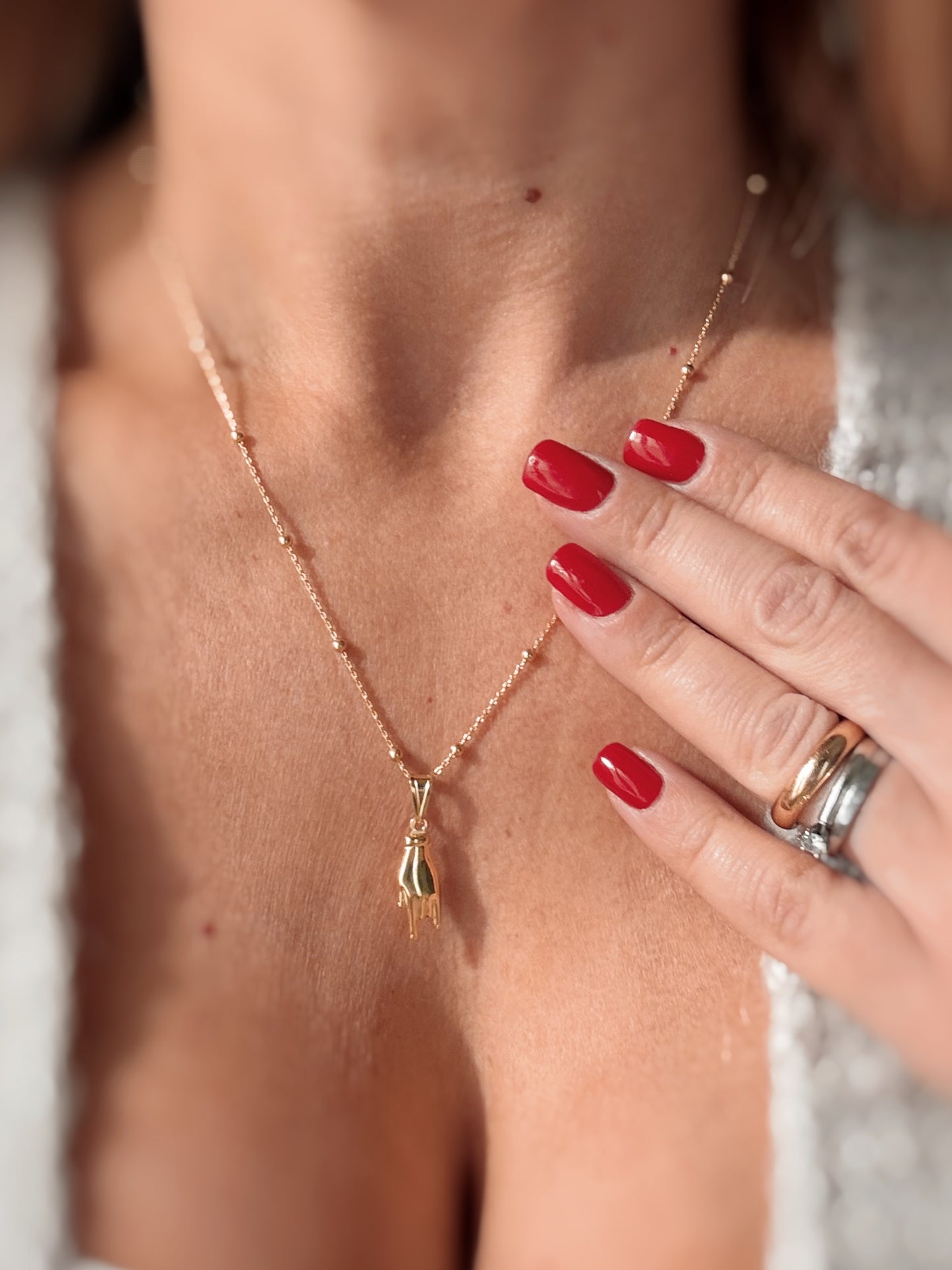 Collana manina corna