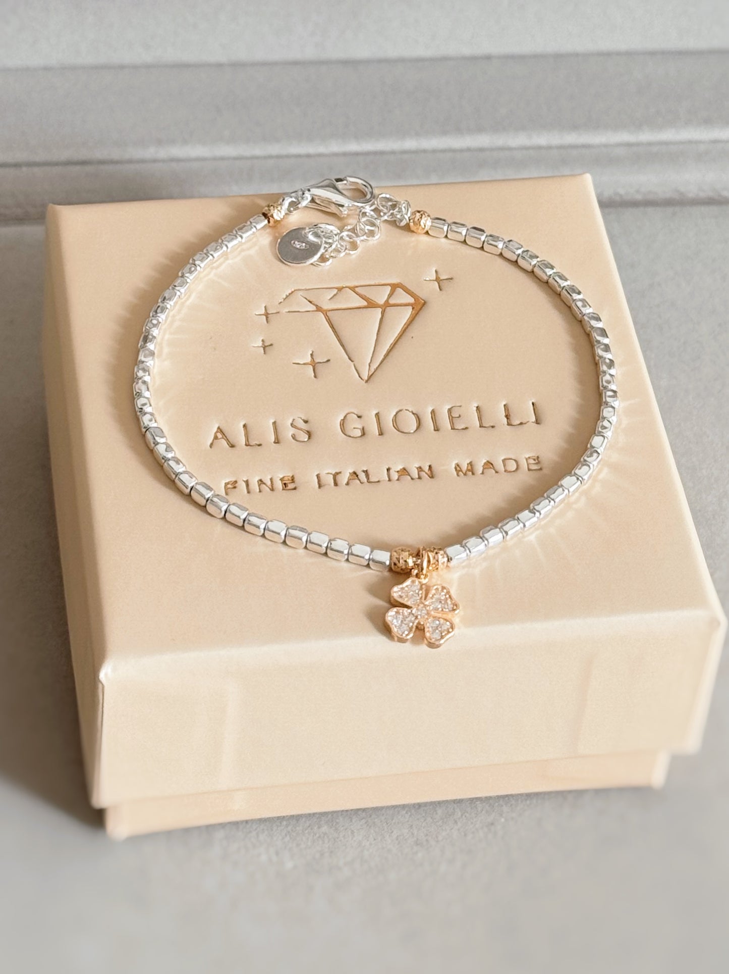 Bracciale cubetti e charm in zirconi