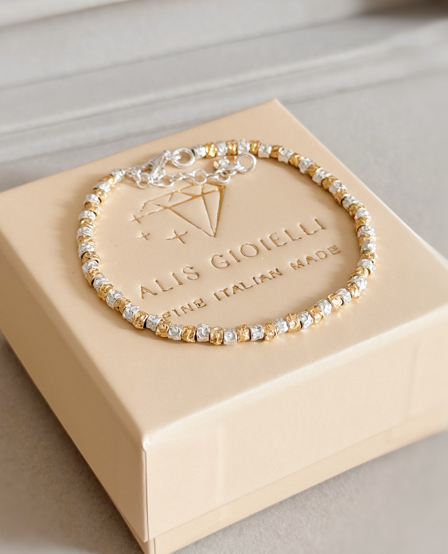 Bracciale granelli bicolor