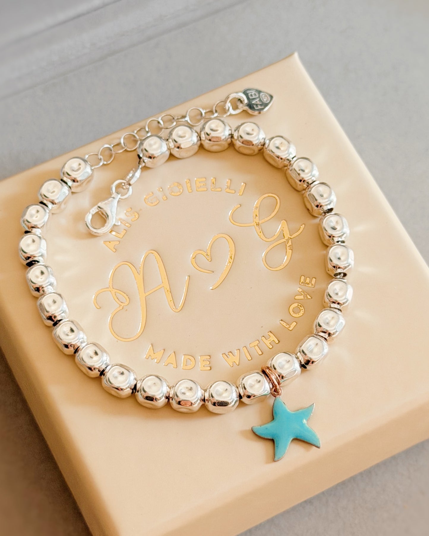 Bracciale cubetti e stella marina