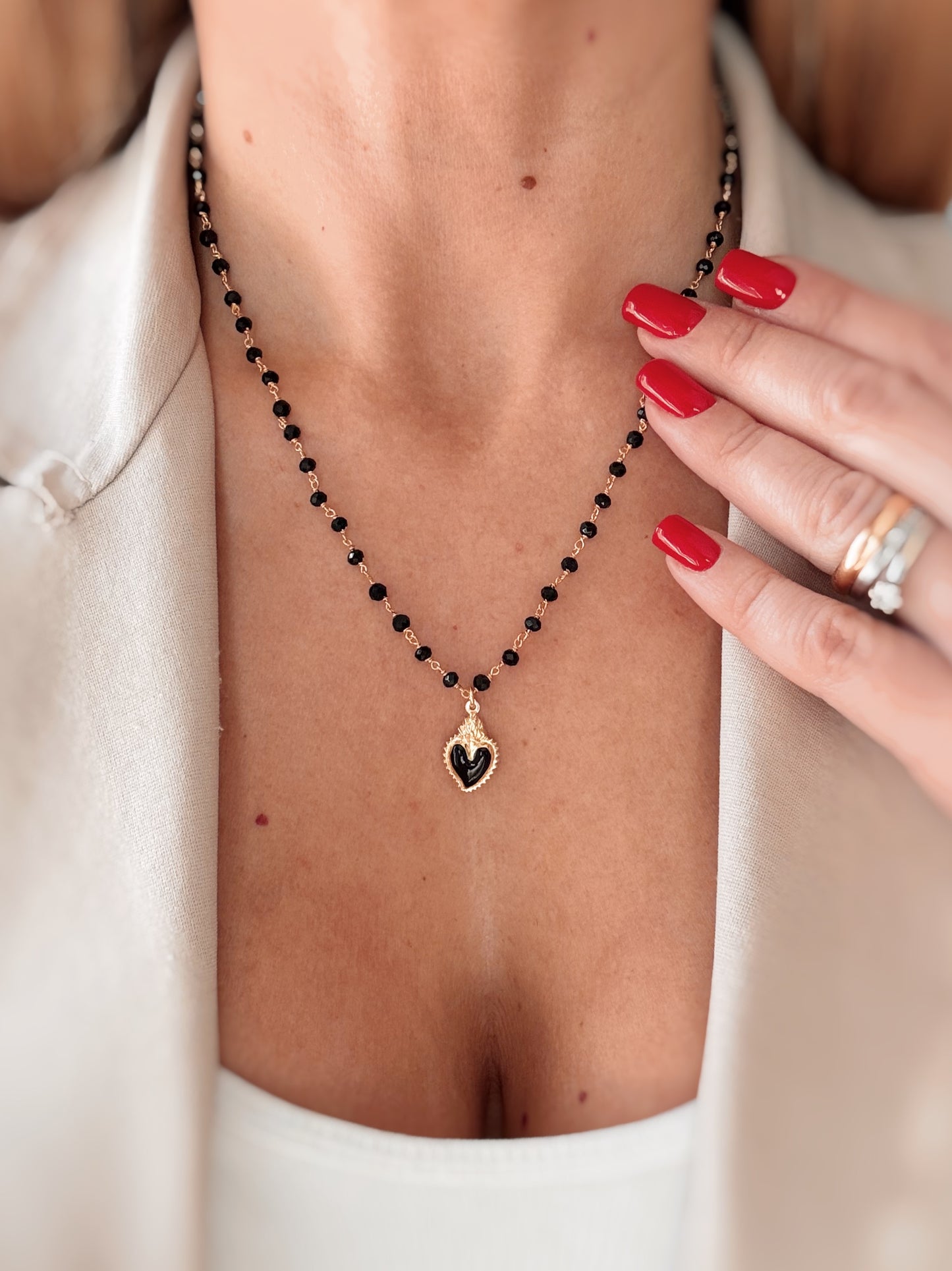 Collana cristalli neri e cuore sacro