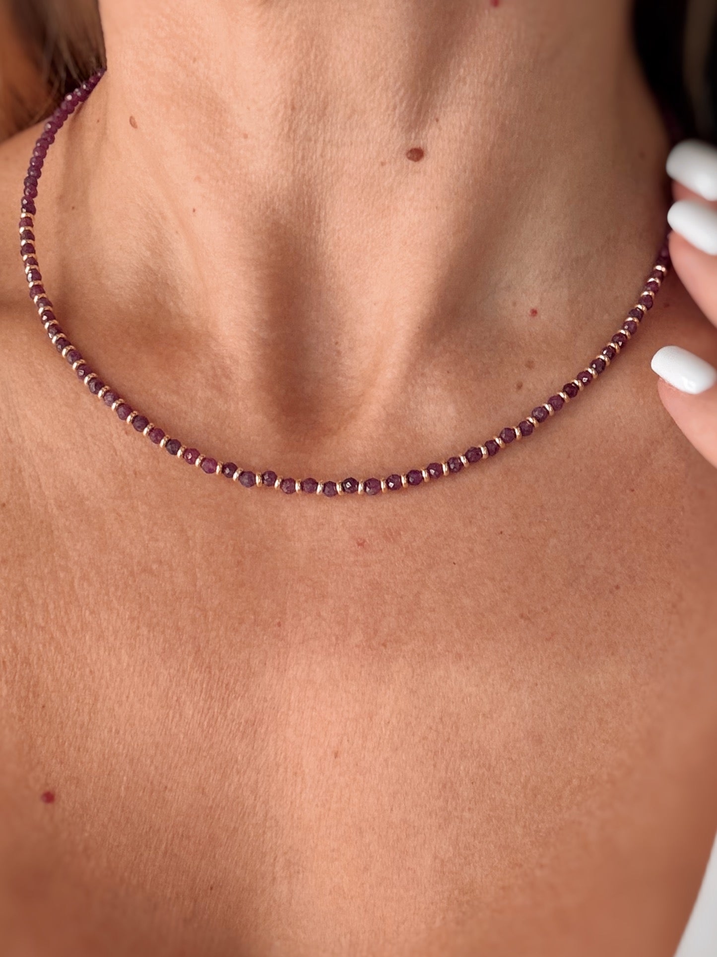 Collana con rondelle e radice di rubino