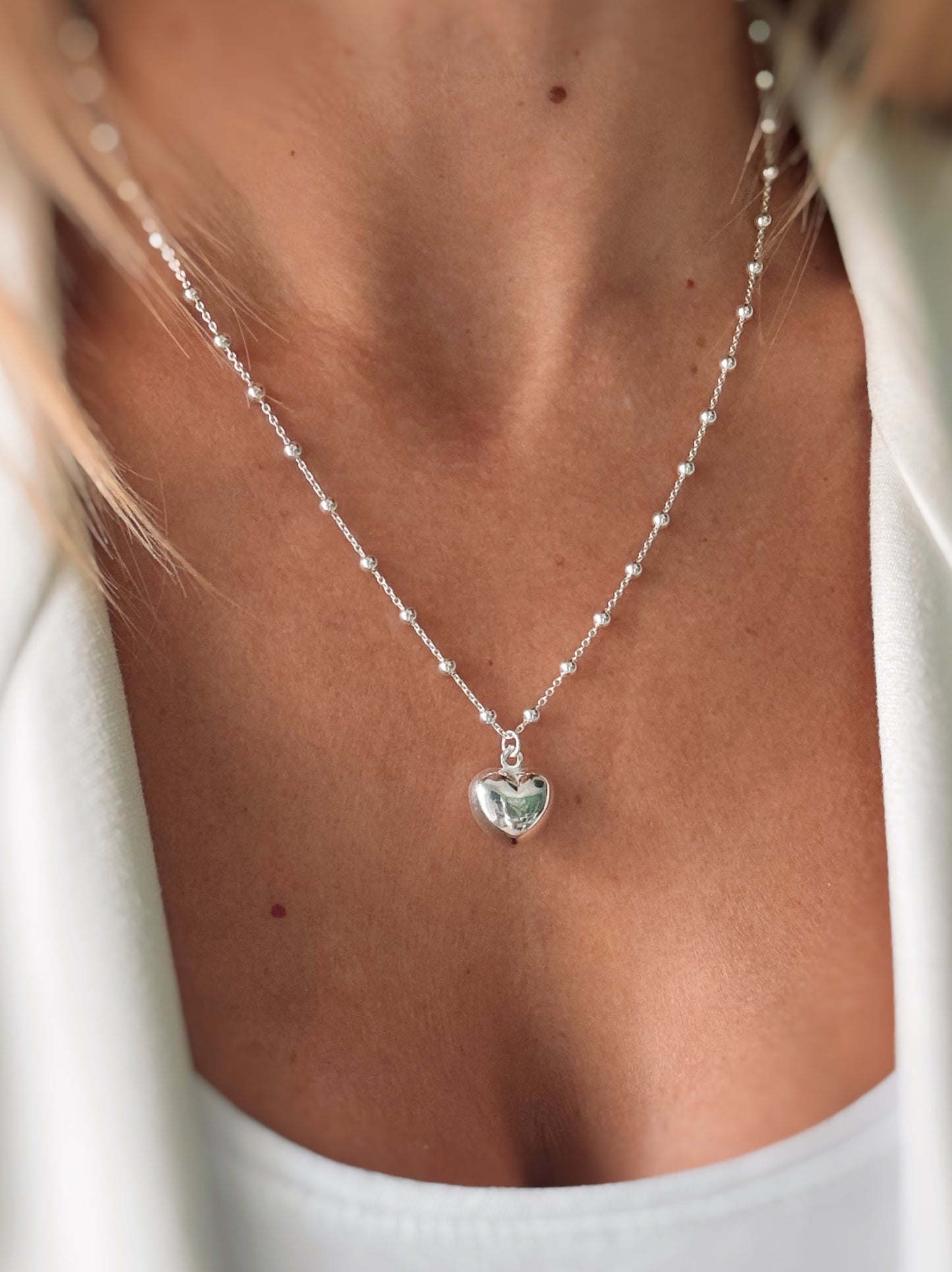 Collana cuore o stella (argento bianco)