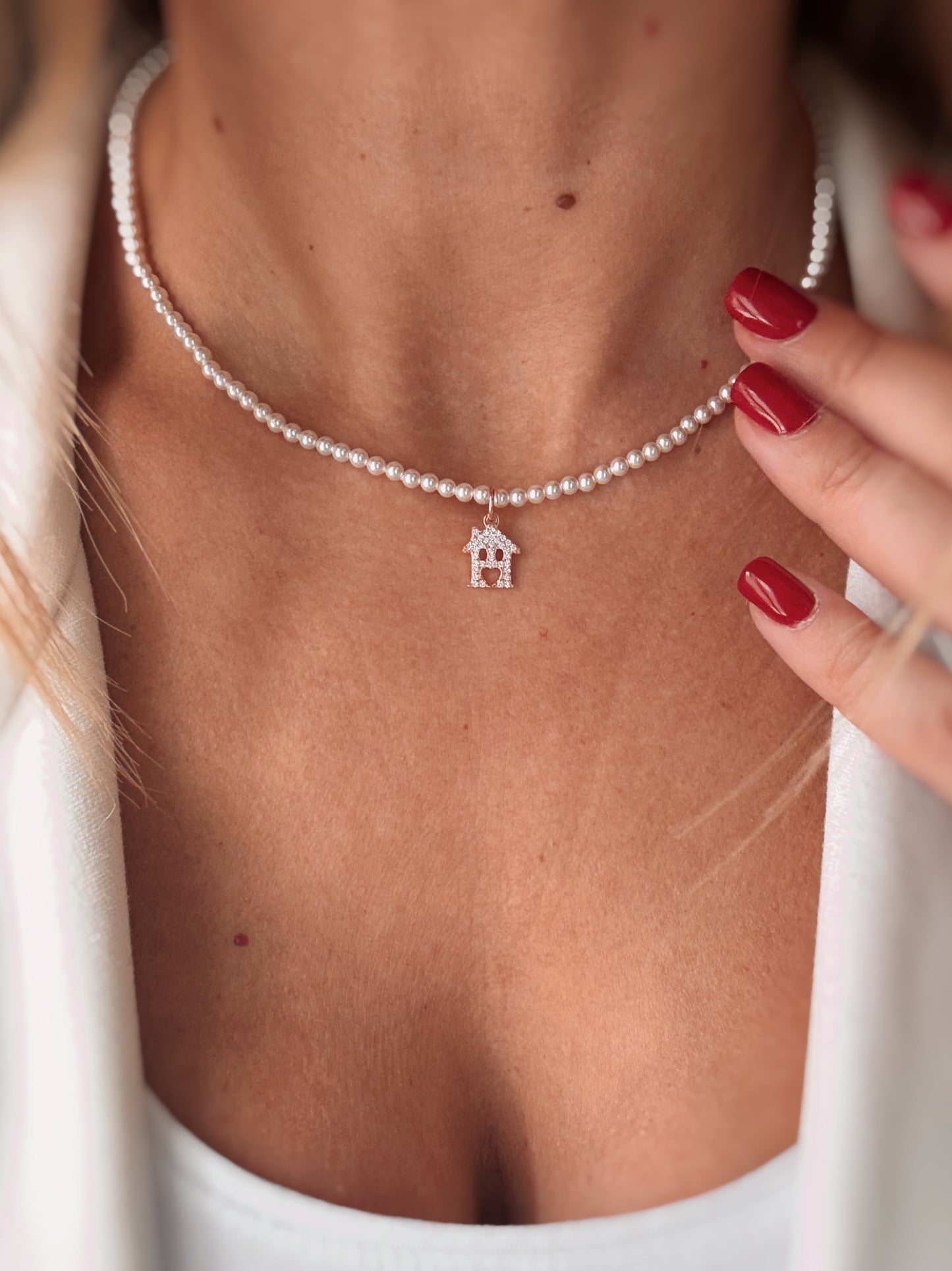 Collana perle e casetta