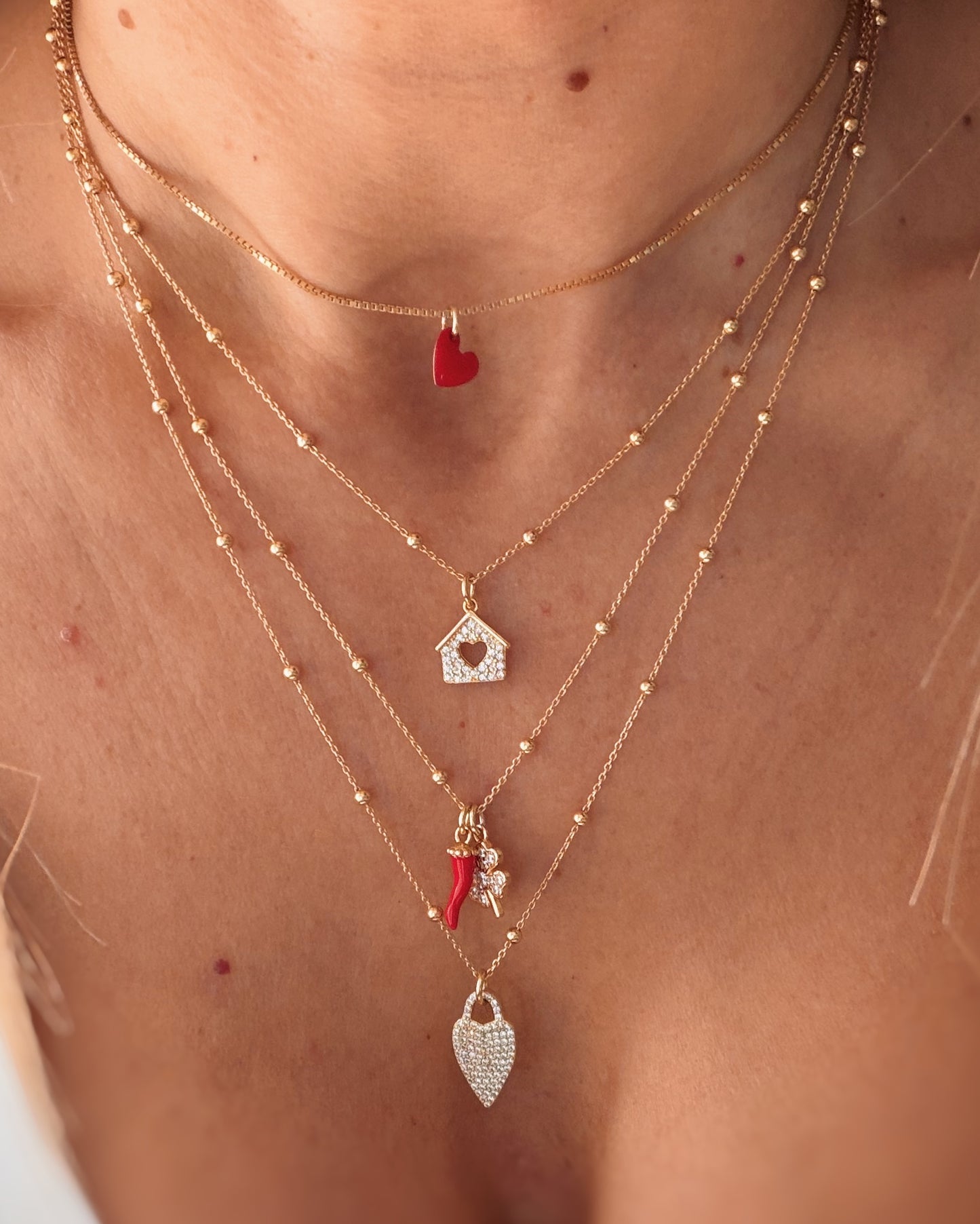 Collana quadrifoglio e corno smaltato