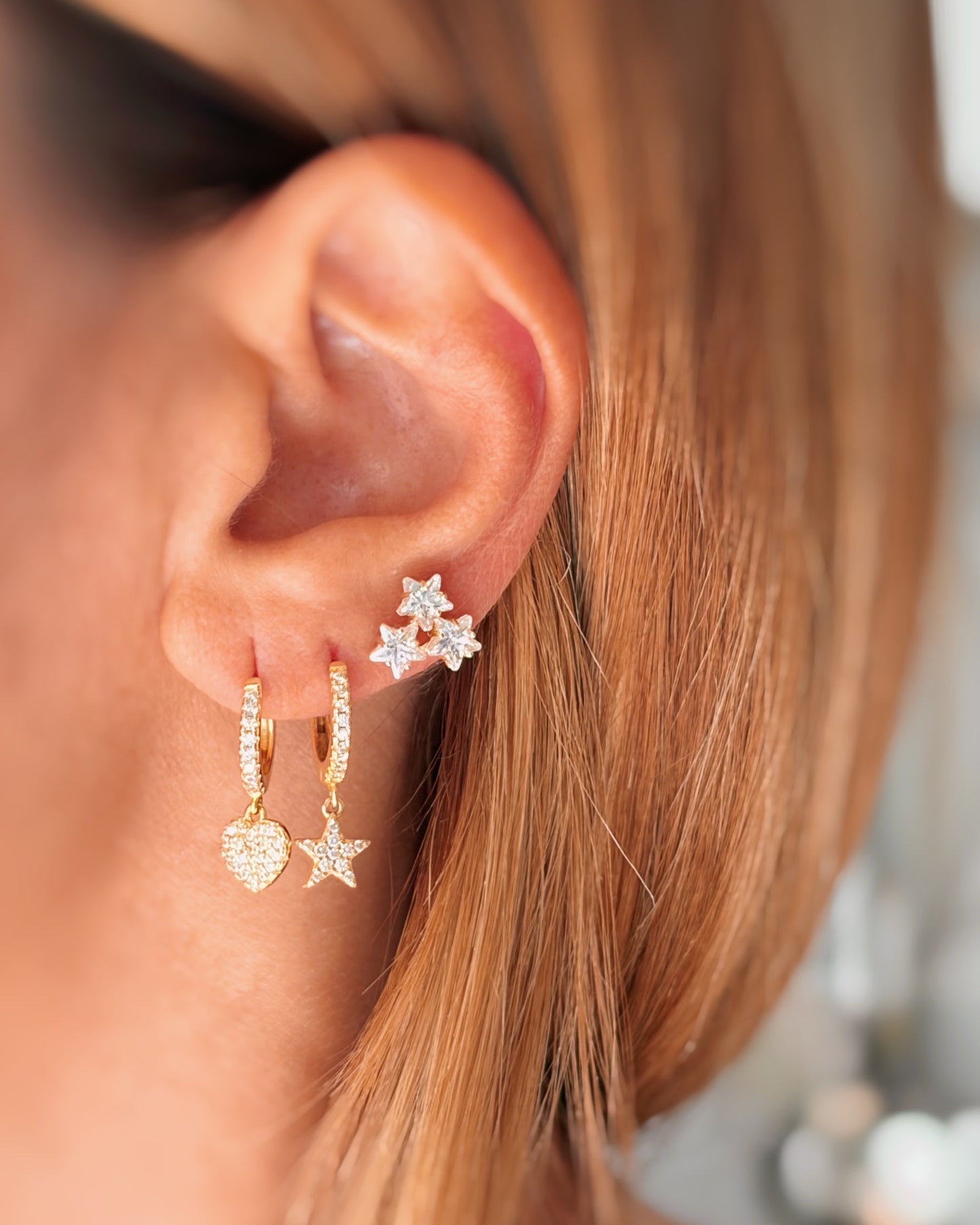 Orecchini a lobo tris stelle