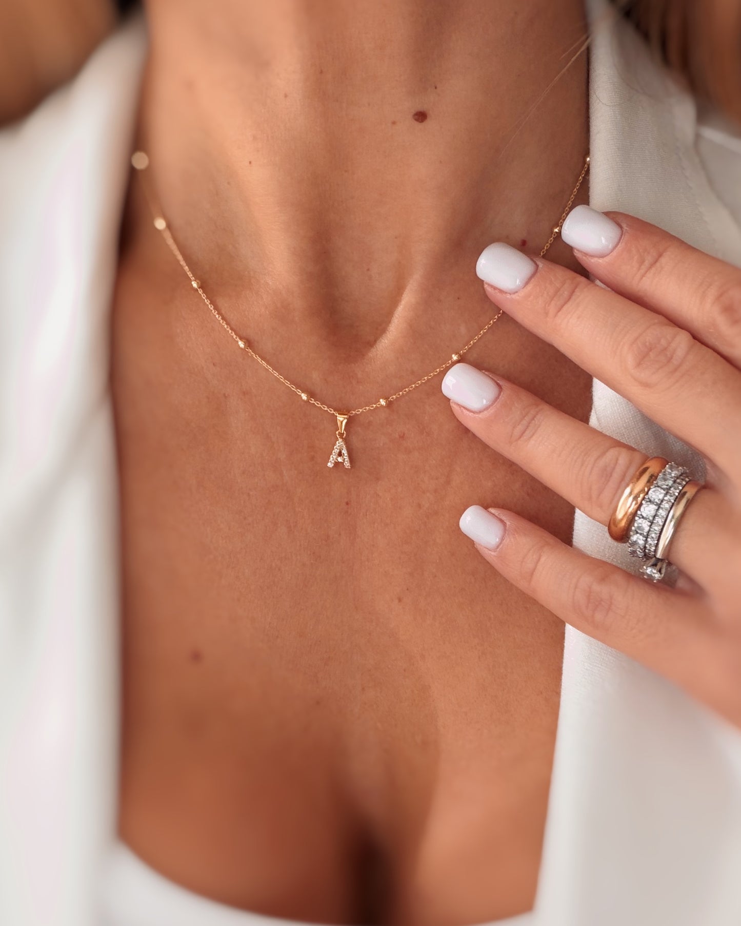 Collana lettera zirconi