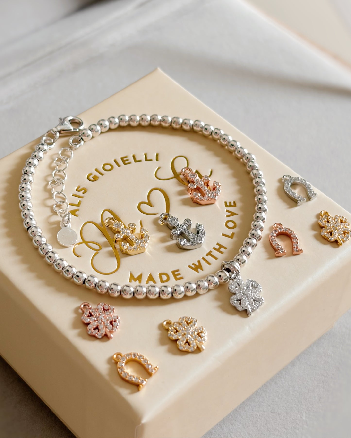 Bracciale sfere e charm zirconi a scelta