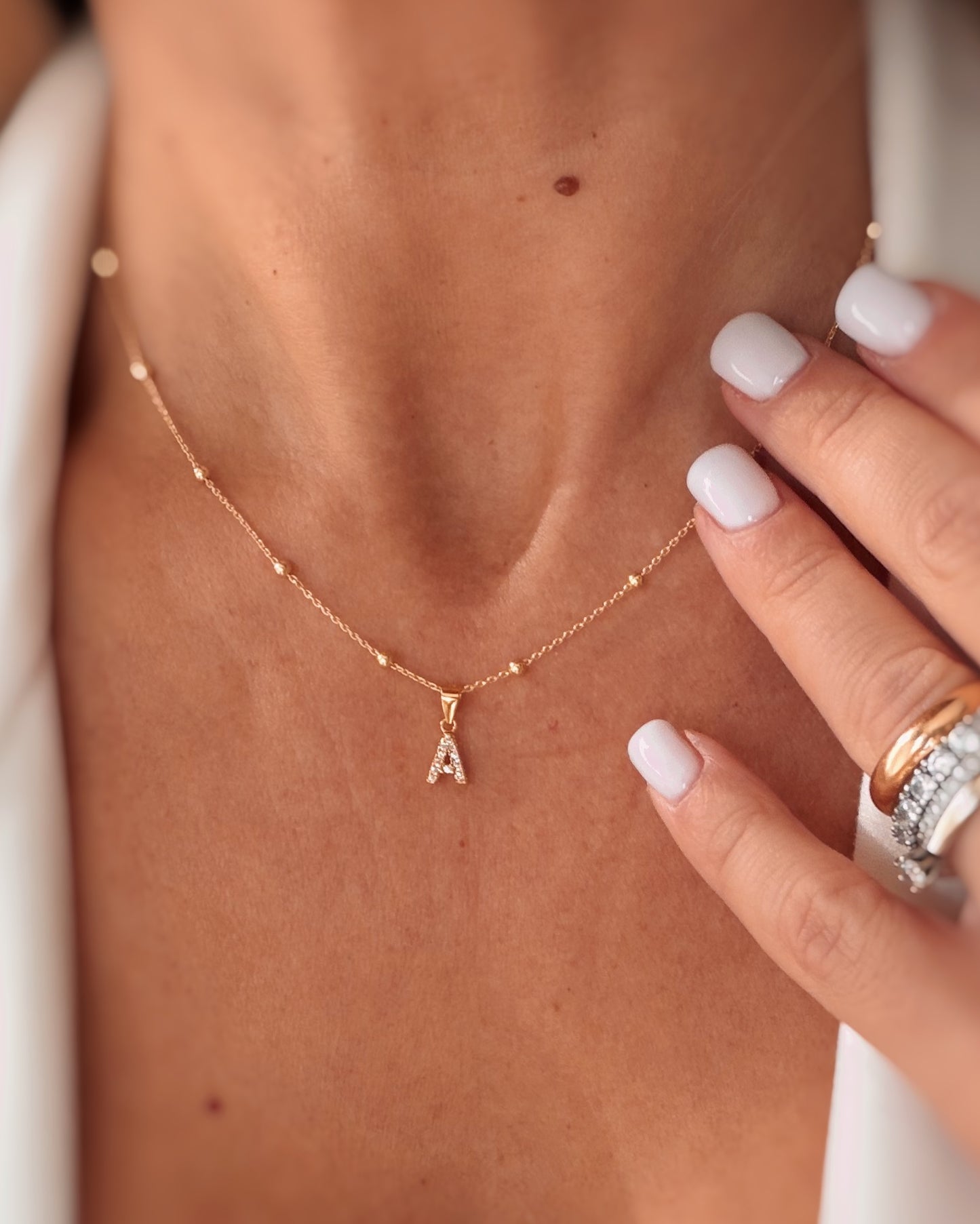 Collana lettera zirconi