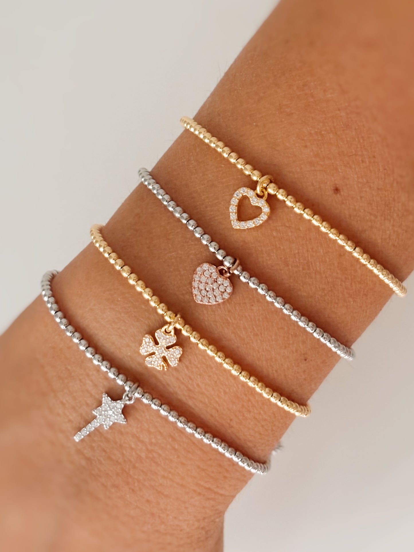 Bracciale mini charm zirconato