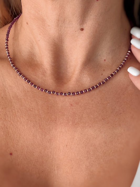 Collana con rondelle e radice di rubino