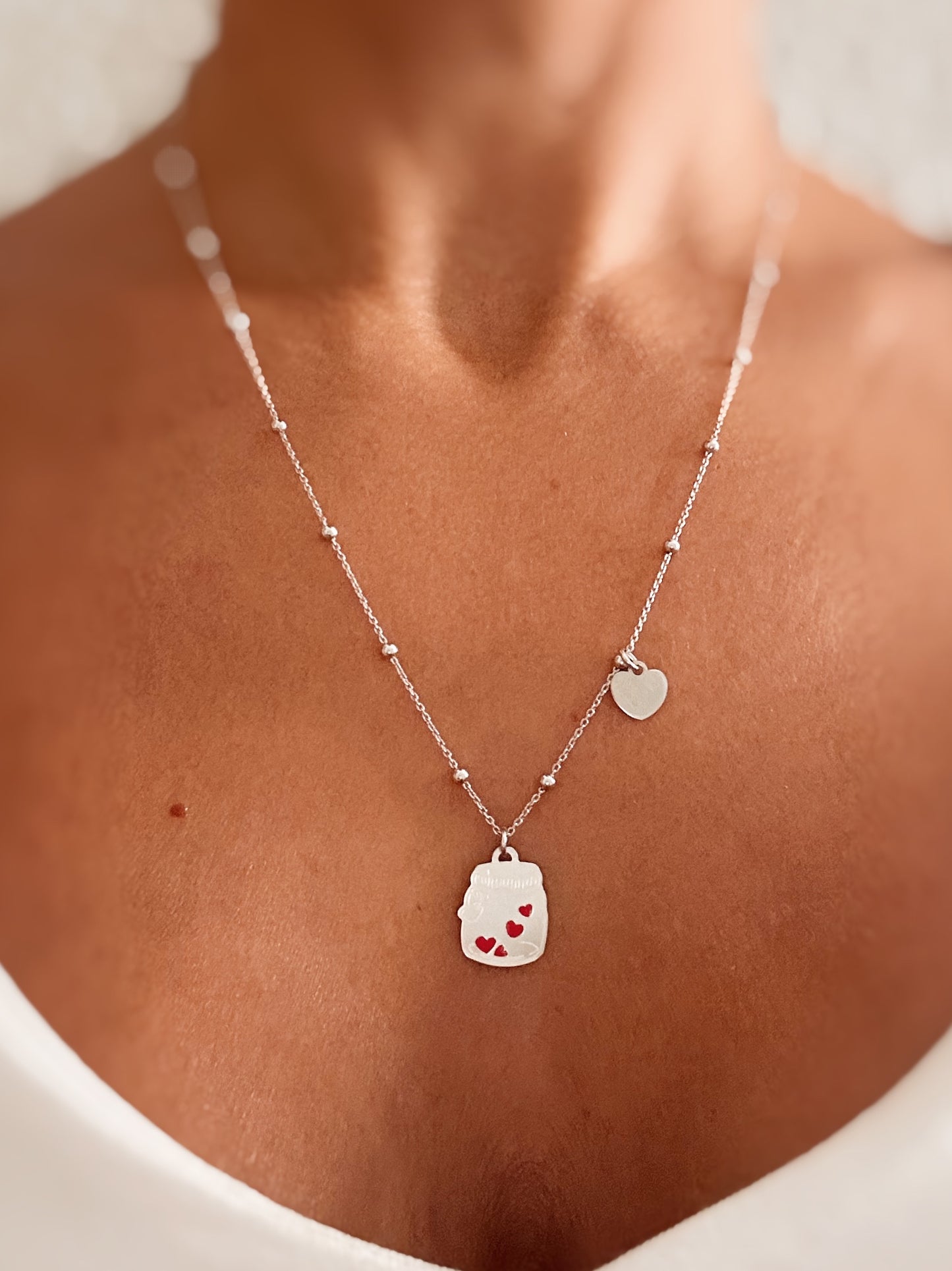 Collana con ciondolo barattolo dell'amore