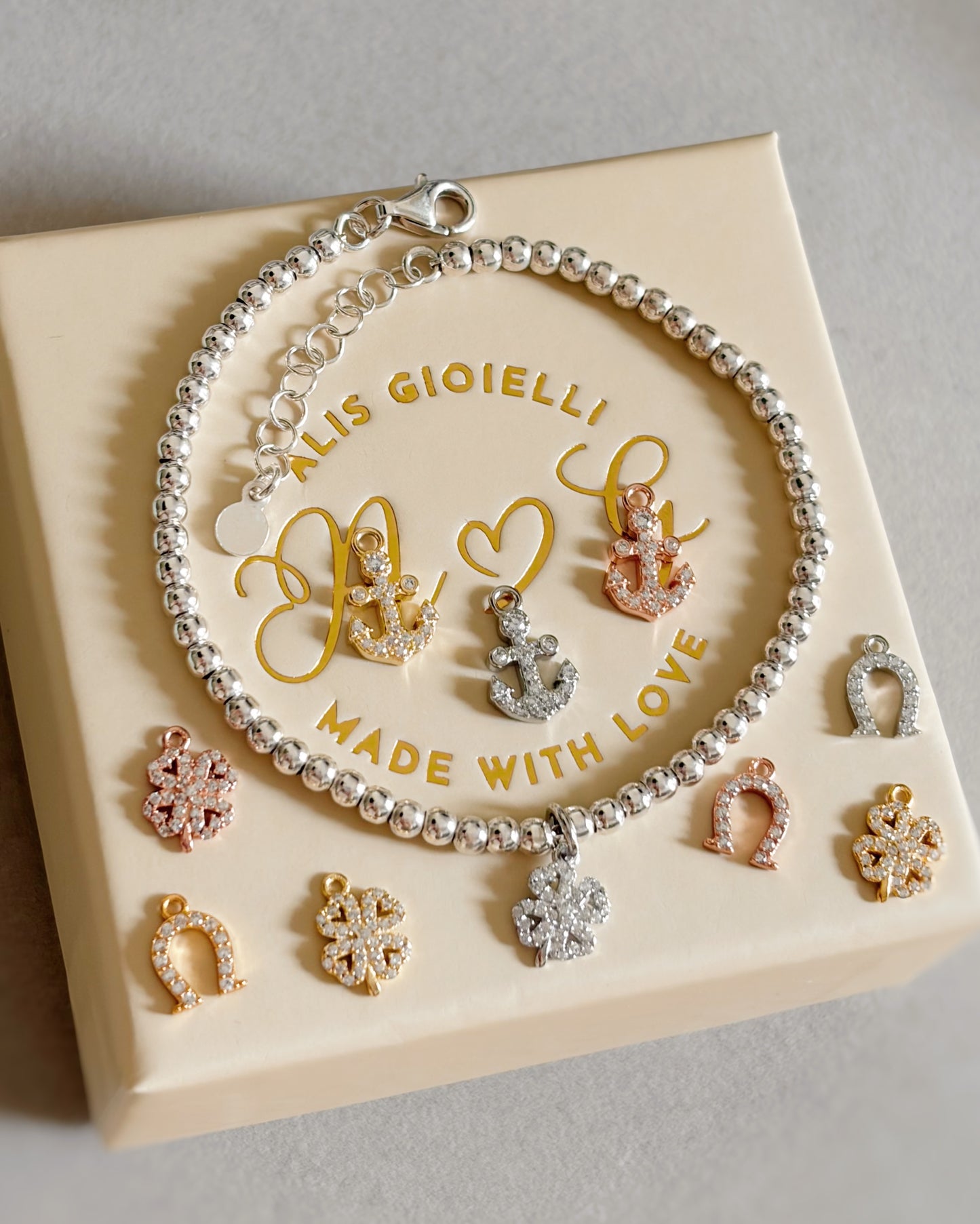 Bracciale sfere e charm zirconi a scelta