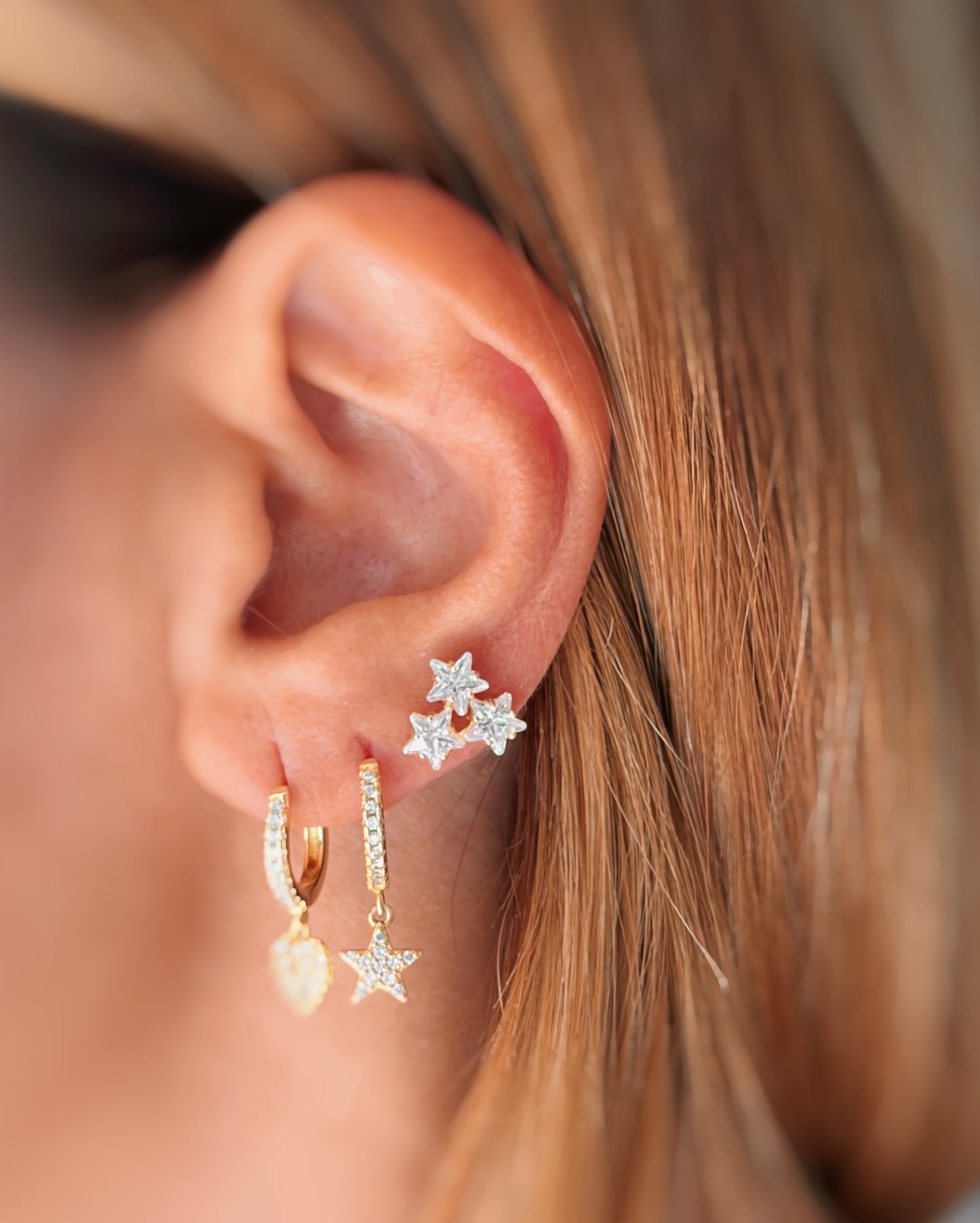 Orecchini a lobo tris stelle
