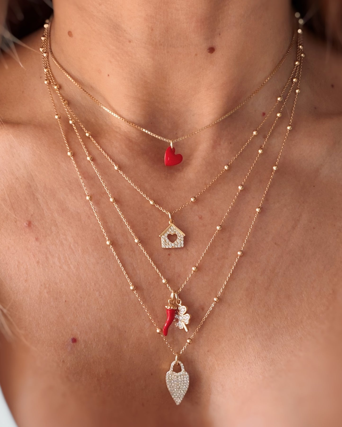 Collana quadrifoglio e corno smaltato