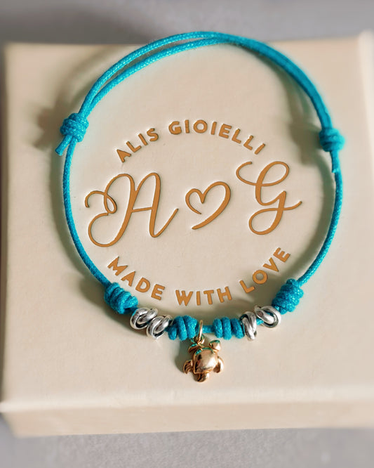 Bracciale cordino e mini charm