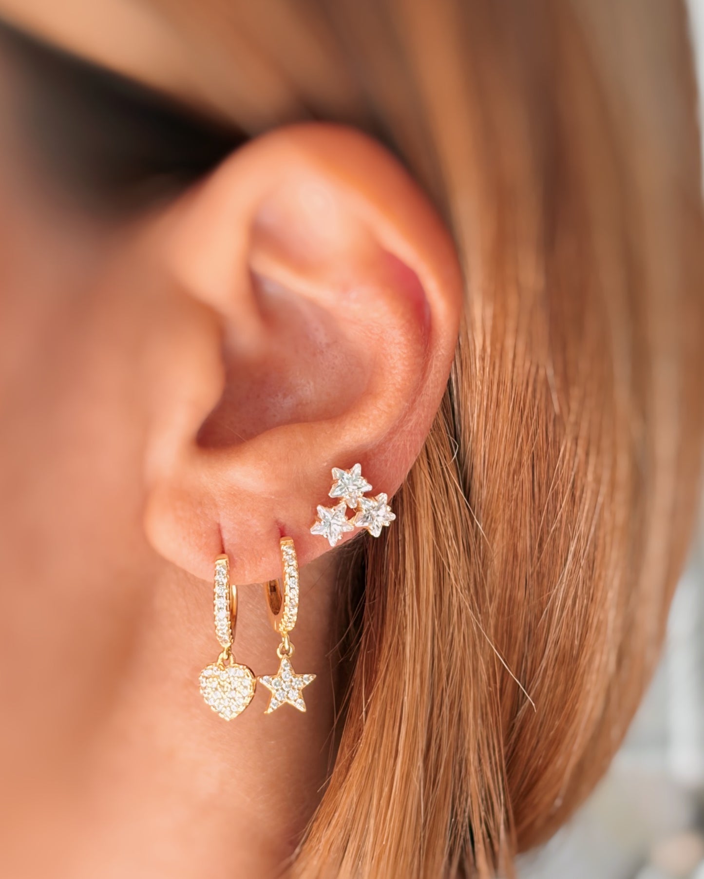 Orecchini a lobo tris stelle