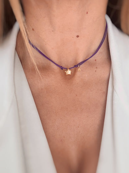 Collana chocker con stellina bombata.