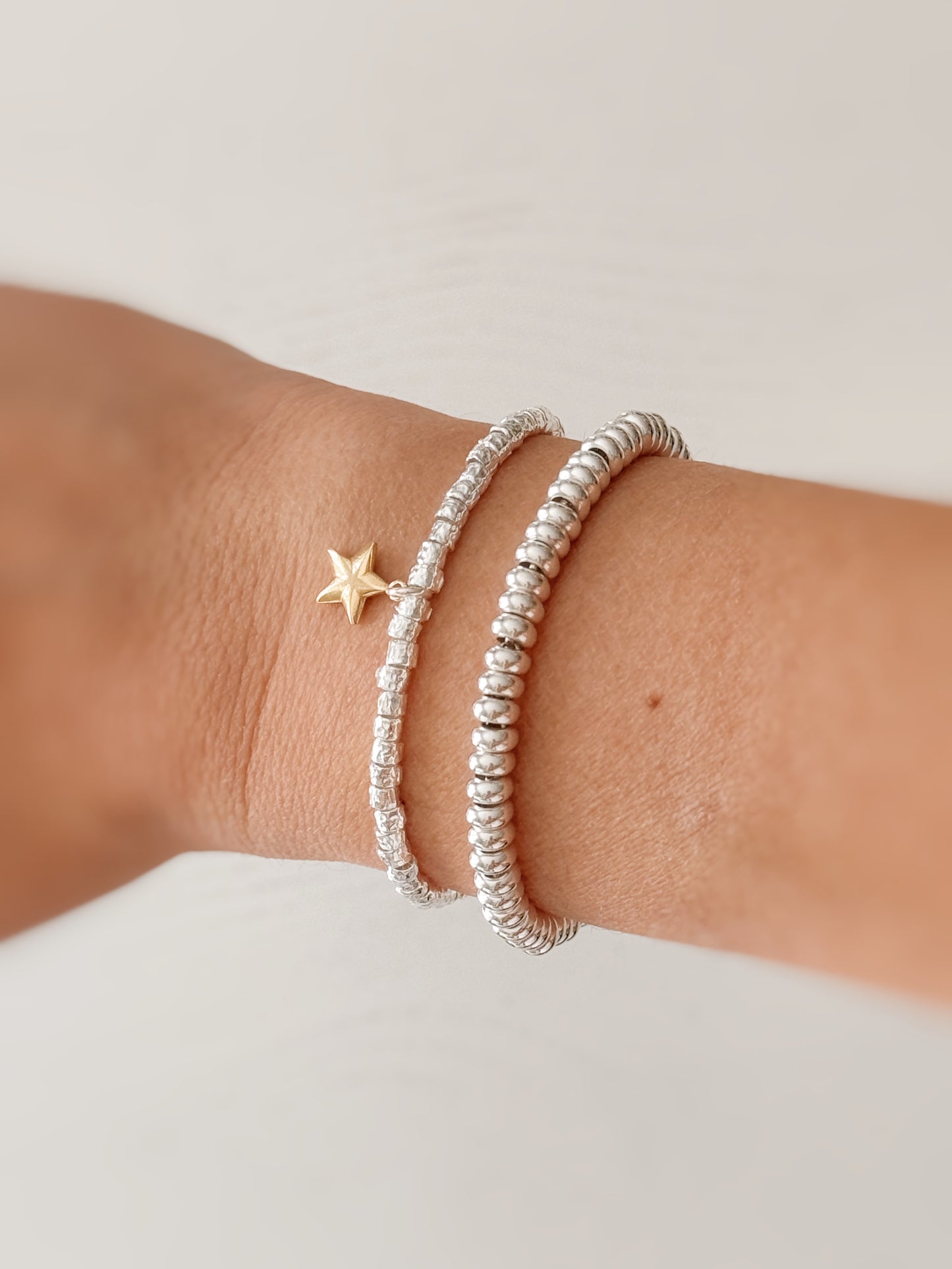 Bracciale granellini e stellina