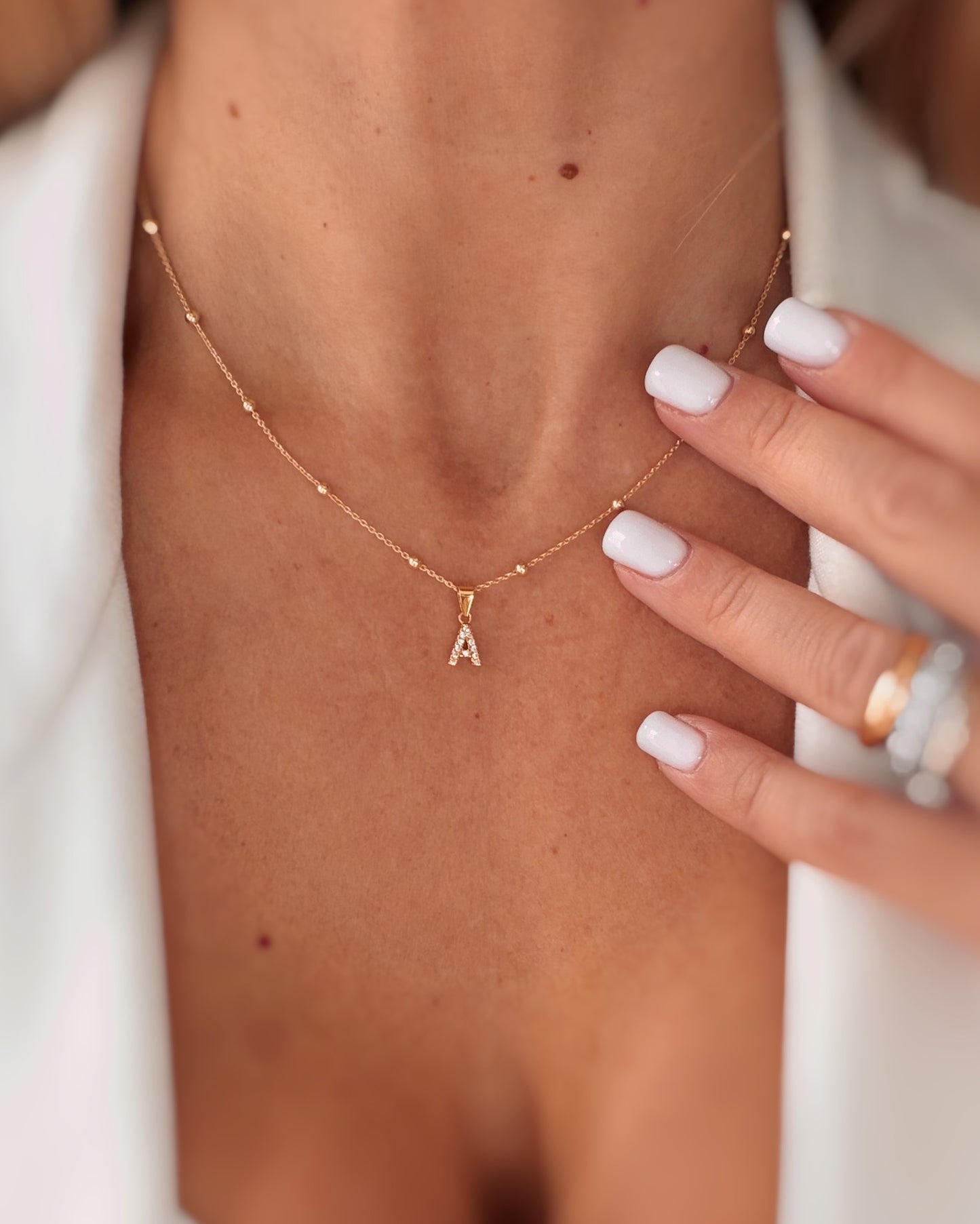 Collana lettera zirconi