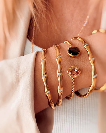 Bracciale rigido doppio castone