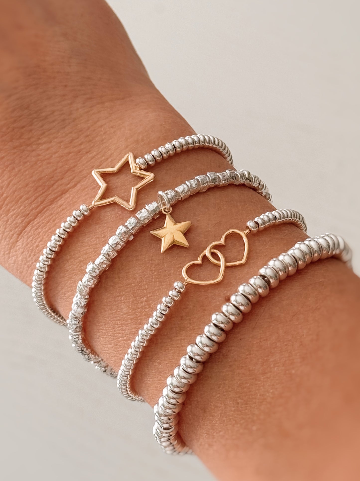 Bracciale granellini e stellina