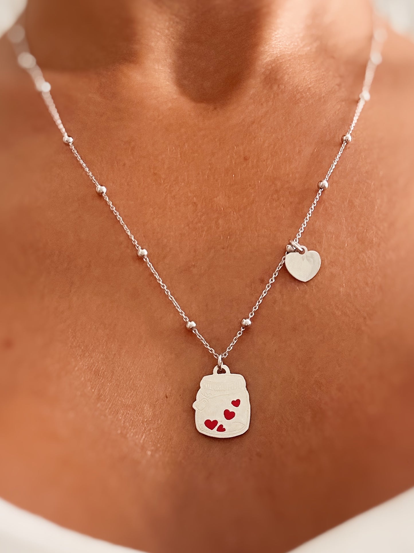 Collana con ciondolo barattolo dell'amore