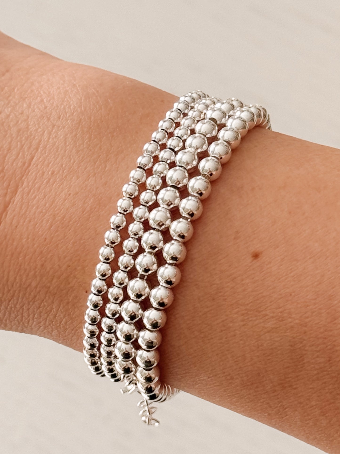 Bracciale sfere argento bianco