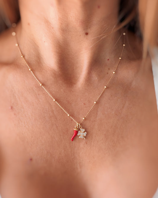 Collana quadrifoglio e corno smaltato