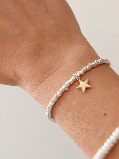 Bracciale granellini e stellina