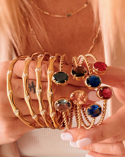 Bracciale rigido doppio castone