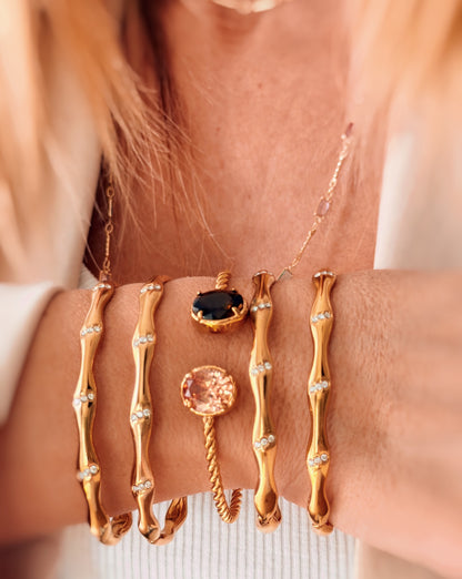 Bracciale rigido doppio castone