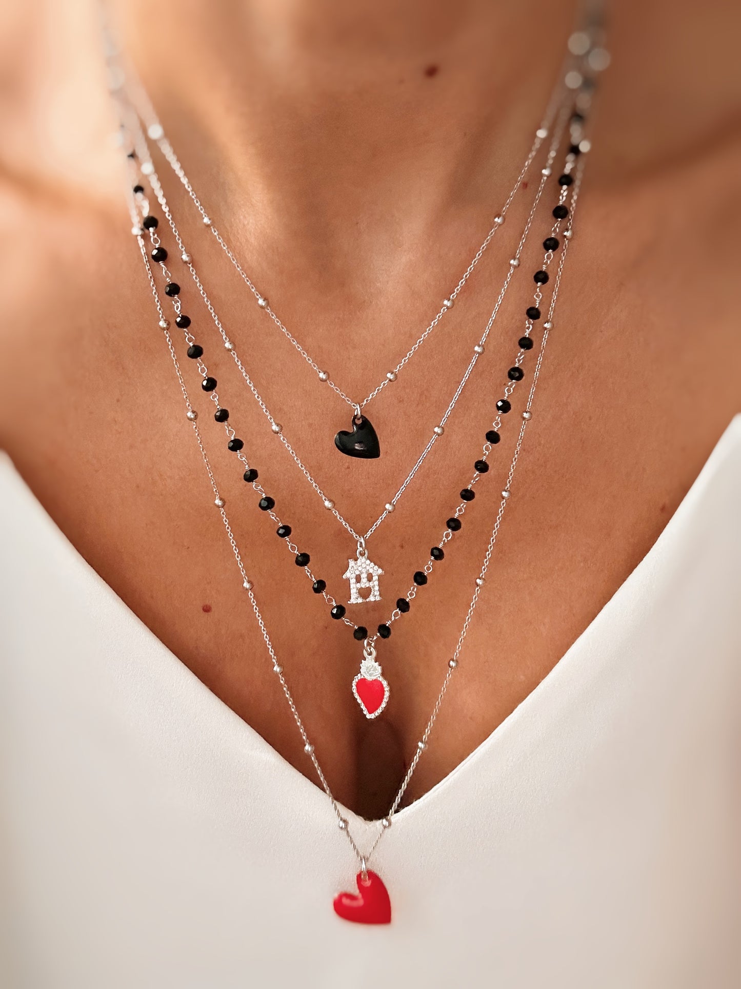 Collana cristalli neri e cuore sacro