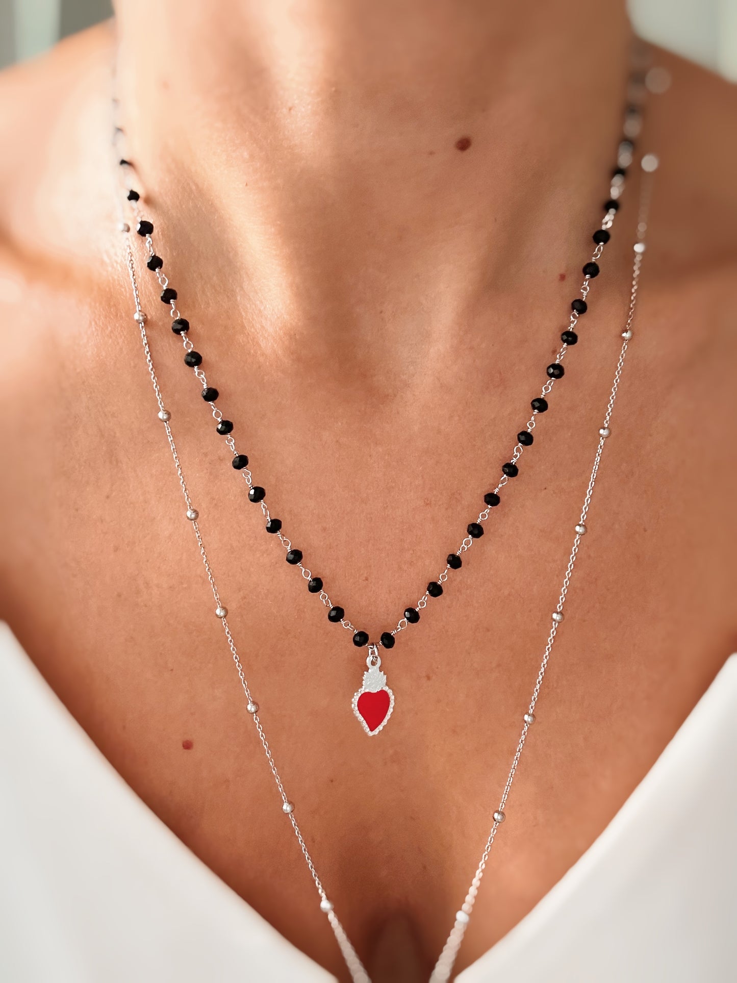 Collana cristalli neri e cuore sacro