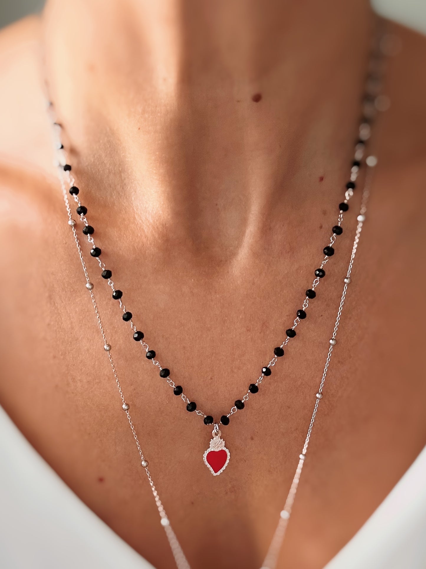 Collana cristalli neri e cuore sacro