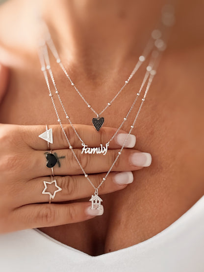 Collana con ciondolo mini cuore a punta e zirconi