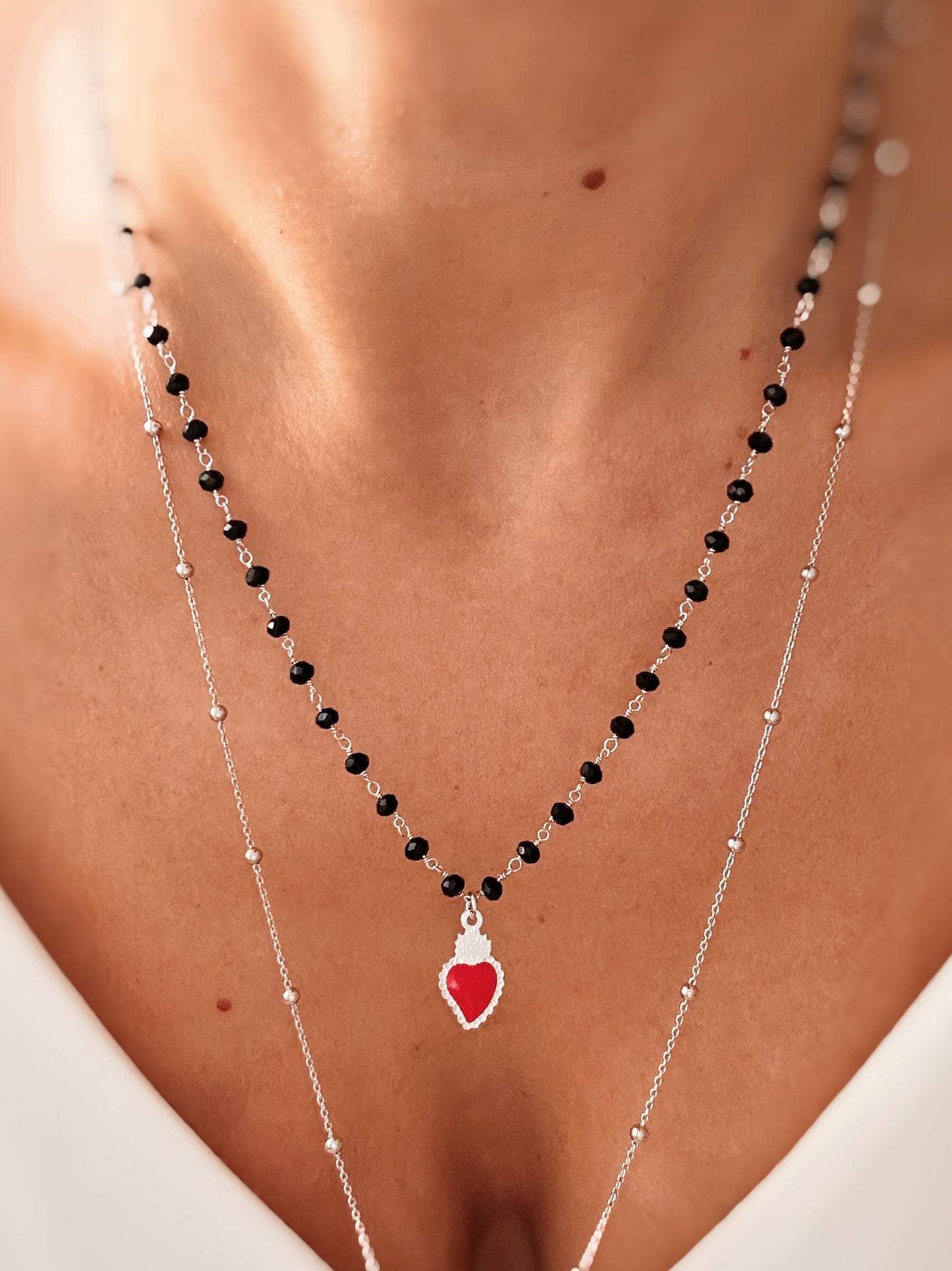 Collana cristalli neri e cuore sacro