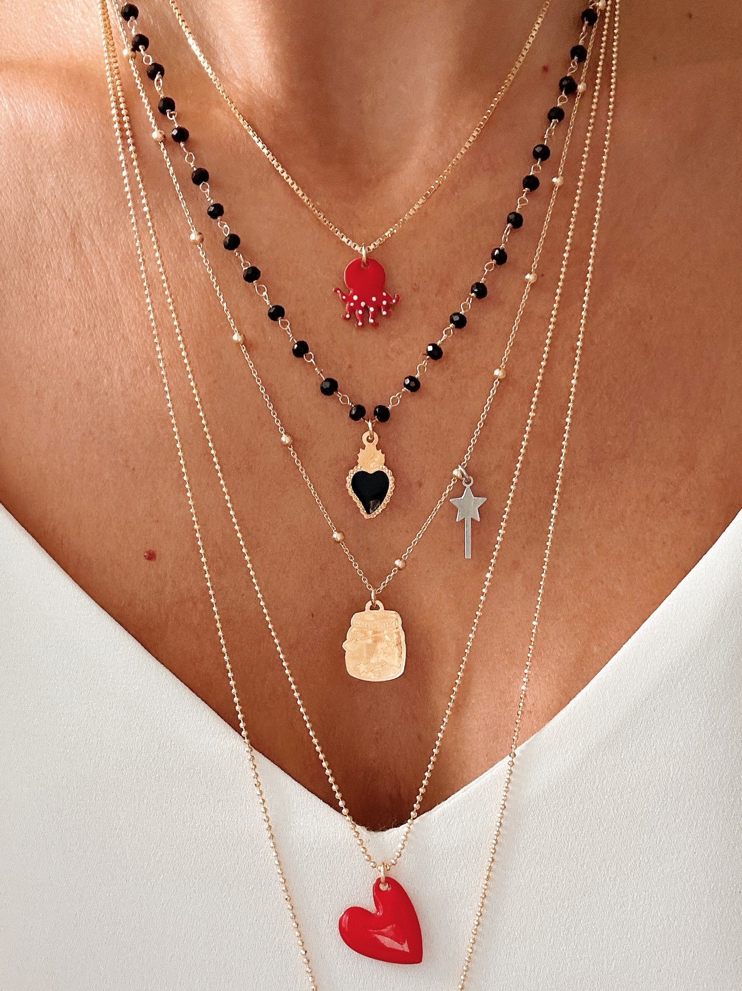 Collana cristalli neri e cuore sacro