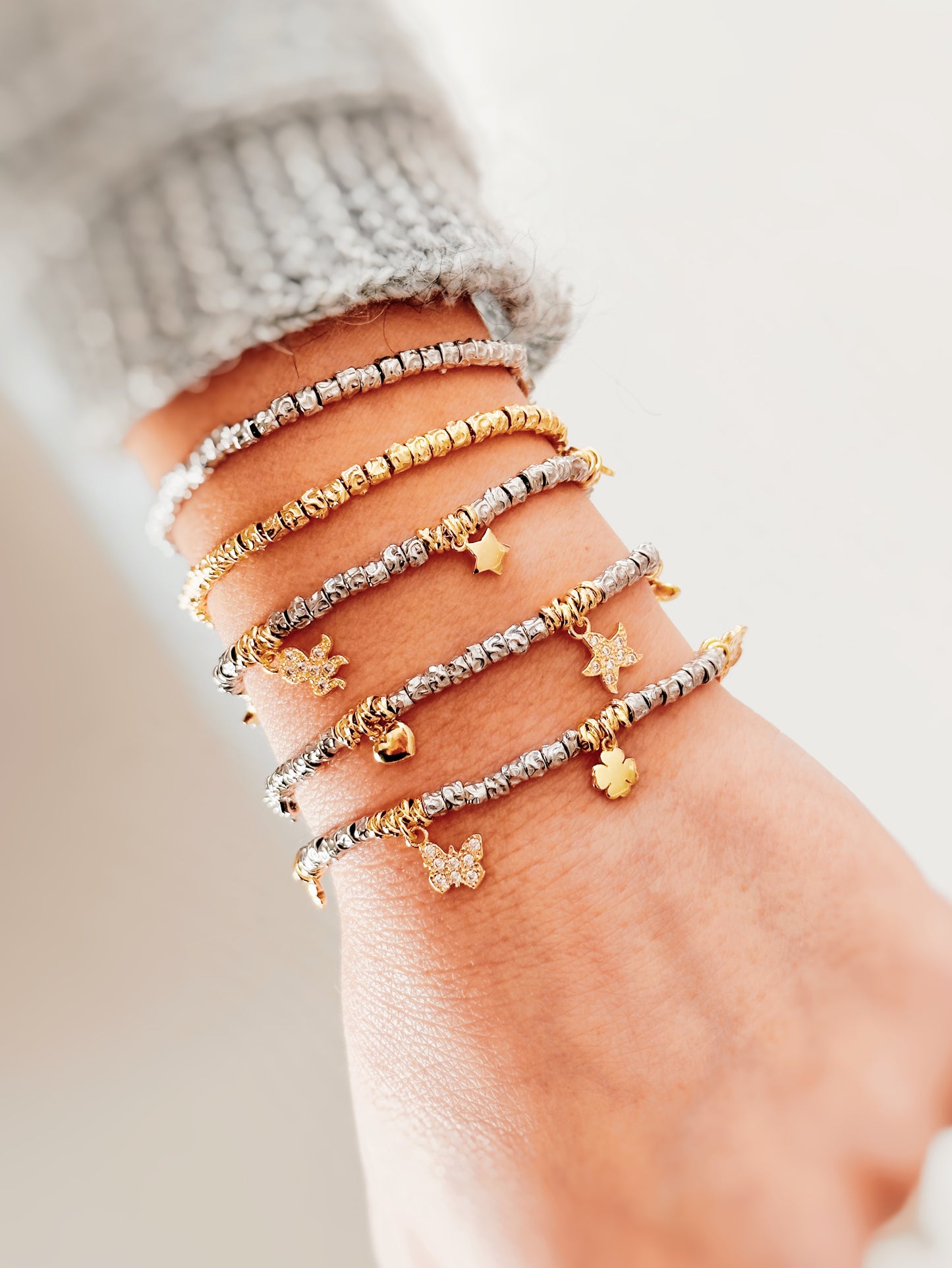 Bracciale granelli con charms