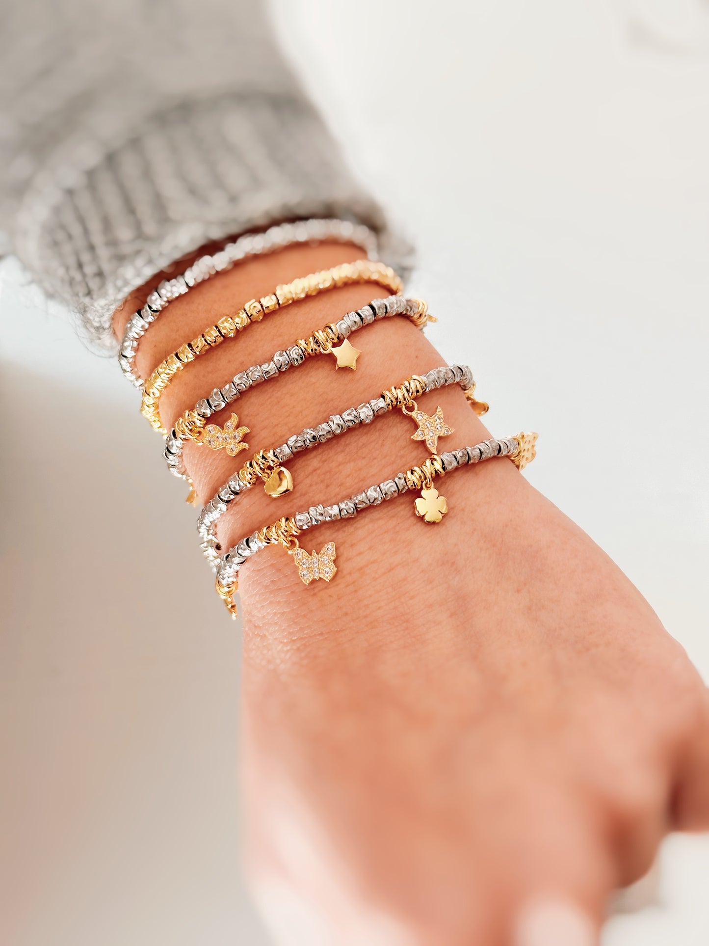 Bracciale granelli con charms