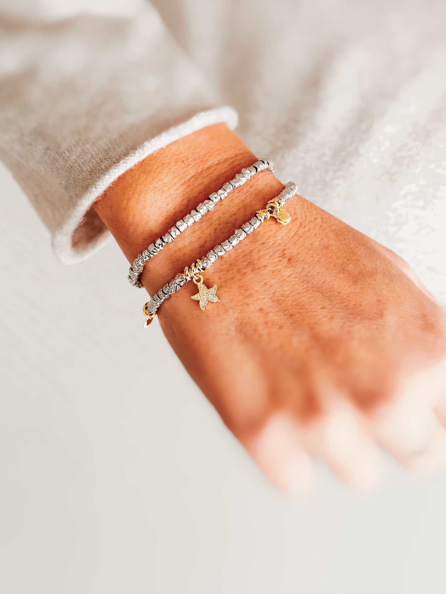 Bracciale granelli con charms